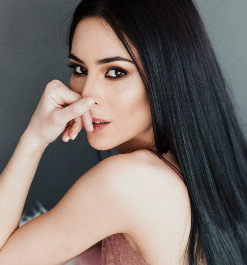 Attractive Woman resting chin on hand